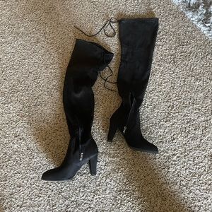 Knee high black boots in size 8.5